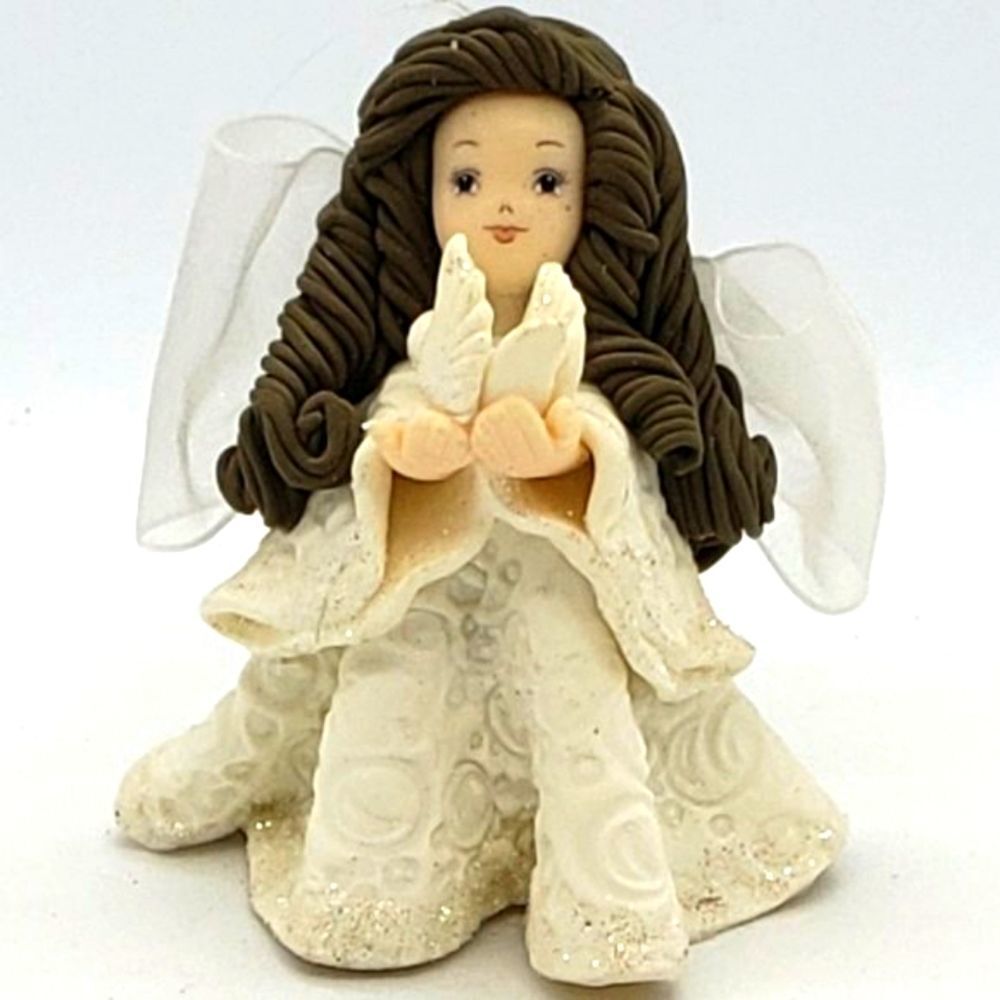 The Kneeded Angels Dove in Hand Ornament by Carol A. Graziano